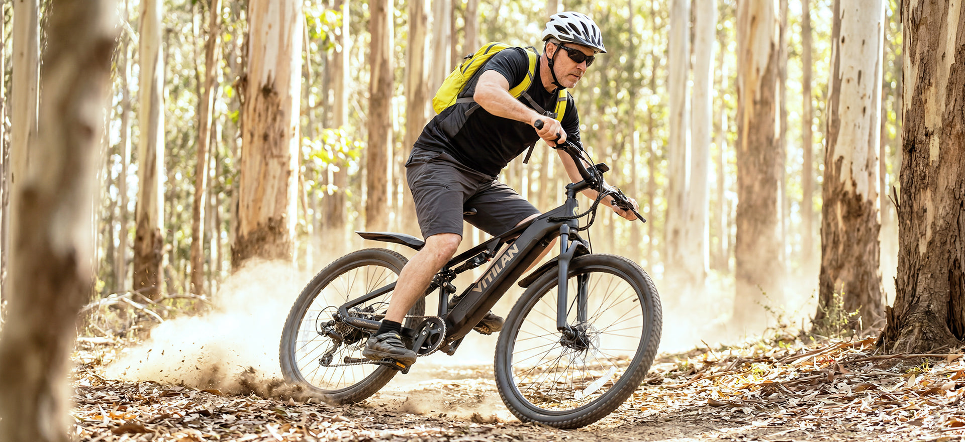 Vitilan M5 electric mountain bike action riding image
