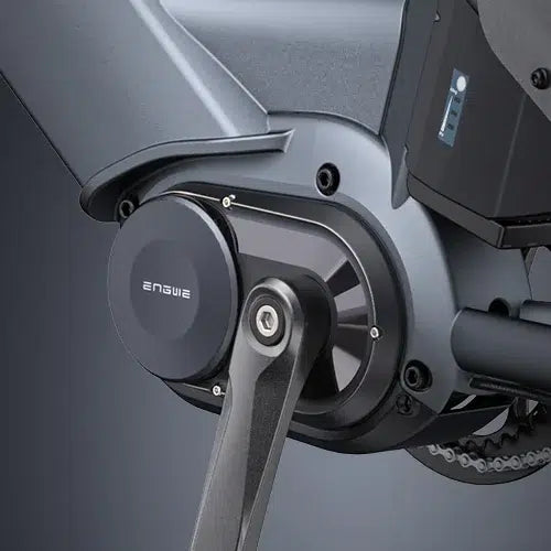 Close-up view of an electric bicycle’s motor and crank arm, showing the brand name ENGWE on the motor casing. The components are sleek and metallic, highlighting modern e-bike design.