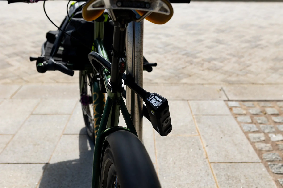 Oxford Grinder S1 260mm anti-angle grinder U-lock - secured through bicycle frame at an anchor point