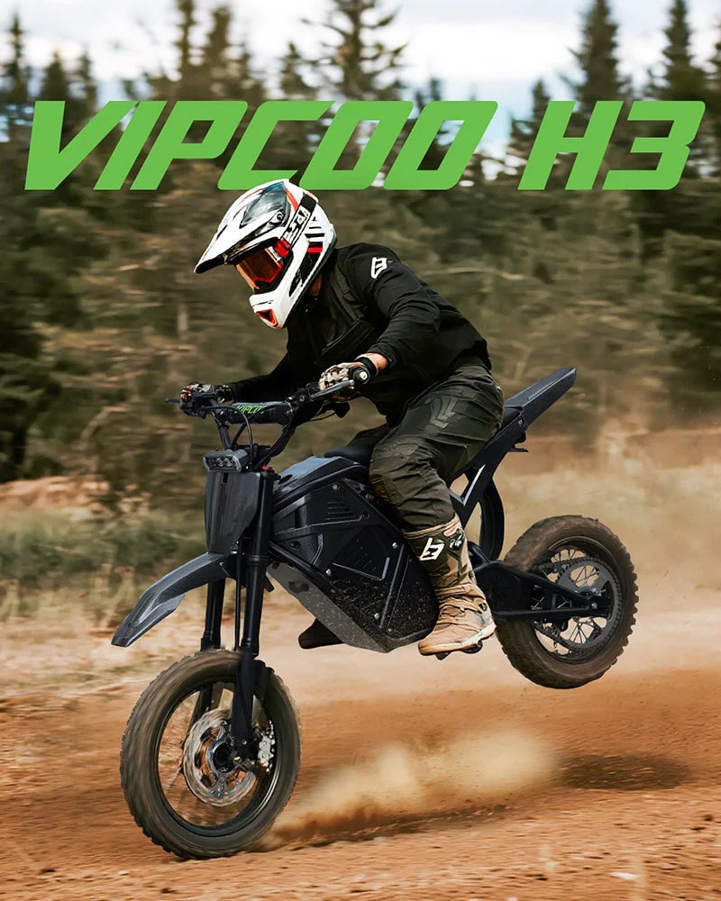 Rider wearing helmet and black gear jumping a black VIPCOO H3 electric dirt bike on a dirt trail outdoors