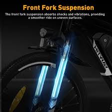 A bicycle’s front wheel and suspension fork are highlighted with glowing blue effects. Text above explains that the front fork suspension absorbs shocks and vibrations for a smoother ride on uneven surfaces.