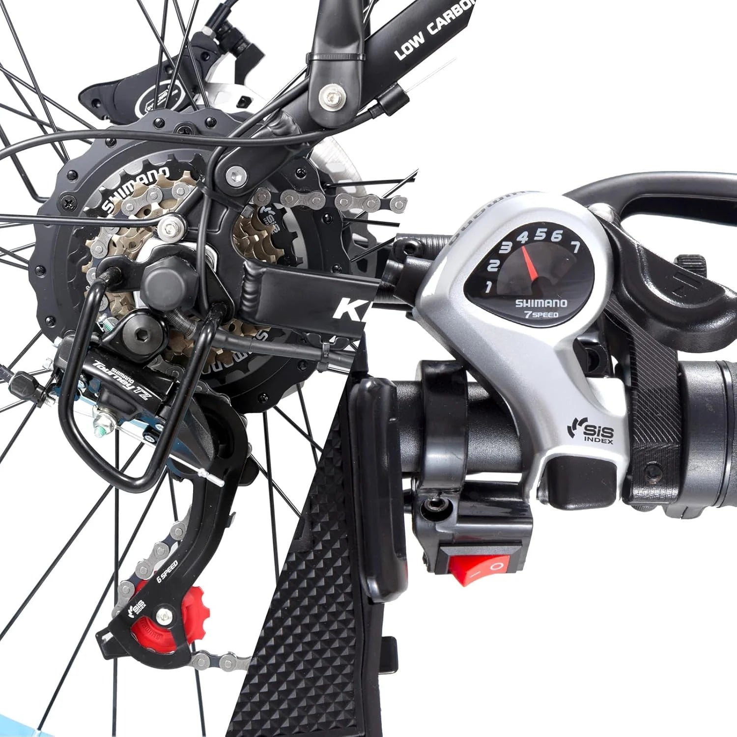 Close-up of a bicycles Shimano gear system, showing the rear derailleur, cassette, chain, and gear shifter with numbered dial, all mounted on the bikes black frame.